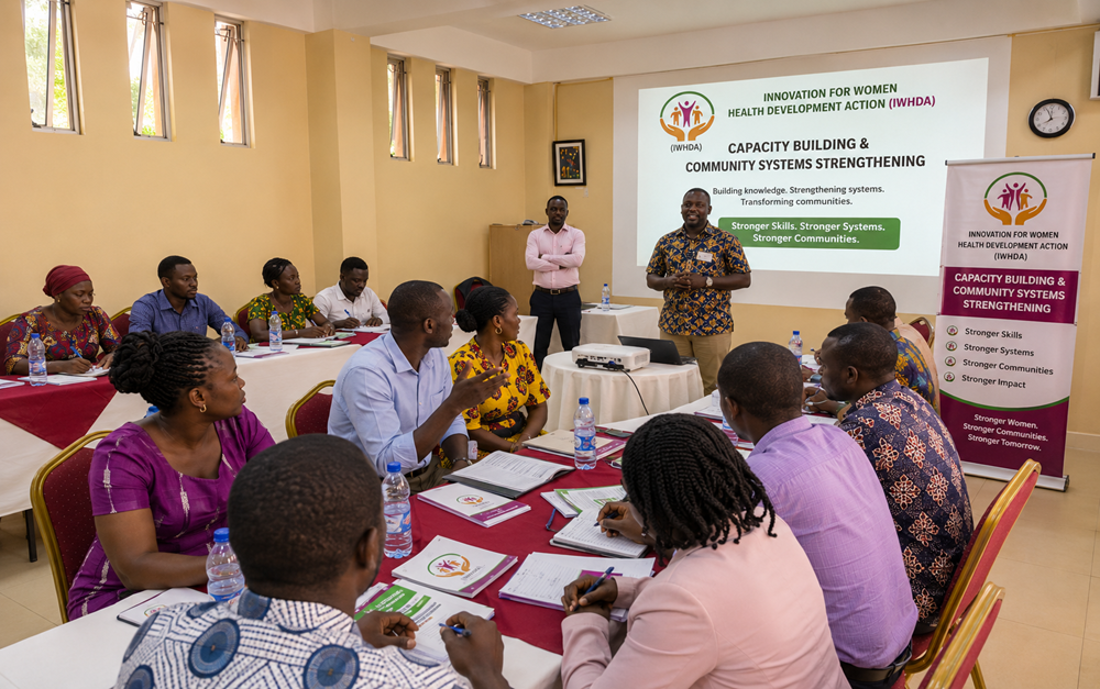 Community members taking part in a group discussion session